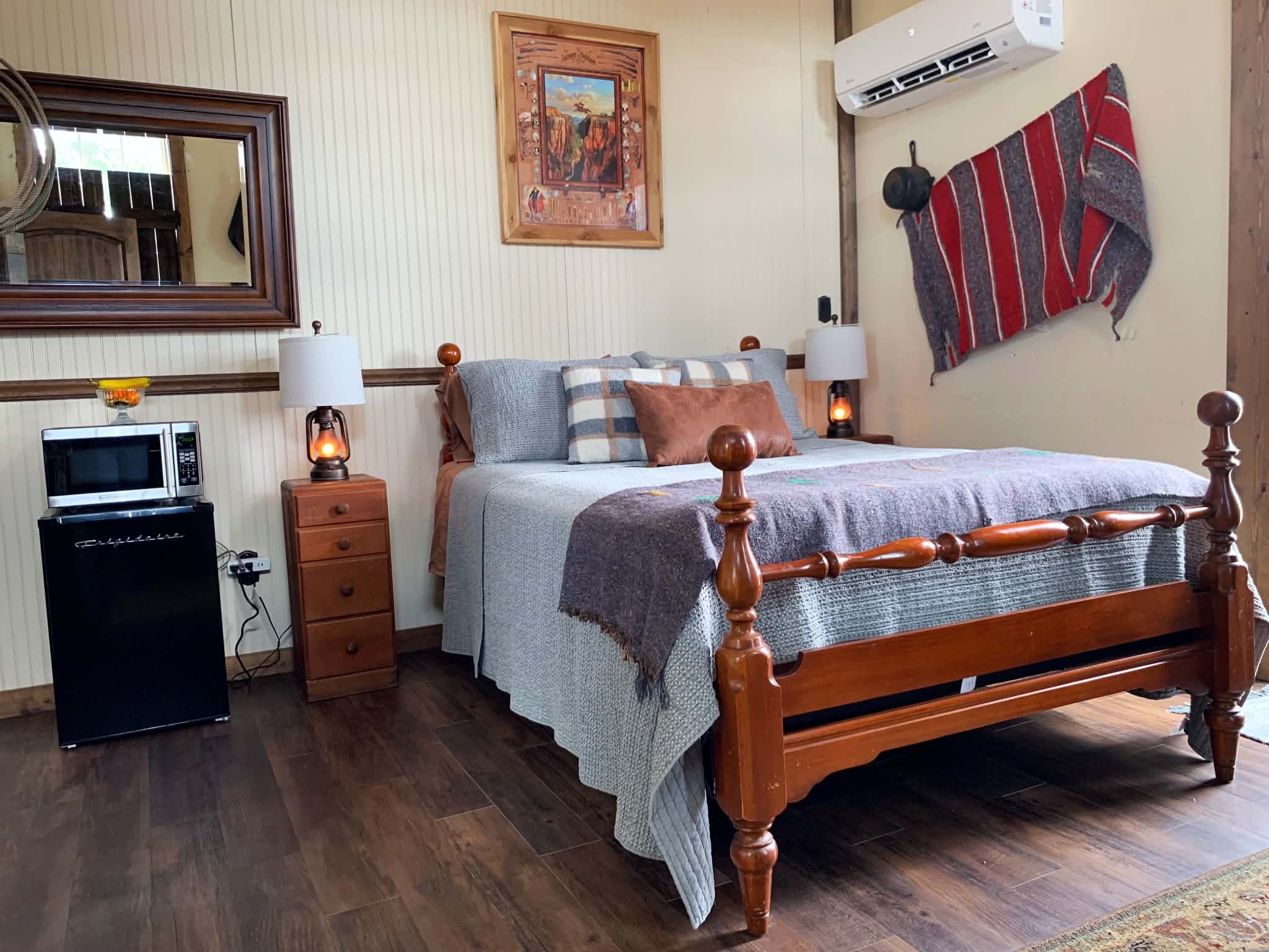 Outlaw Overlook — rustic corner room overlooking Walnut Springs Main Street